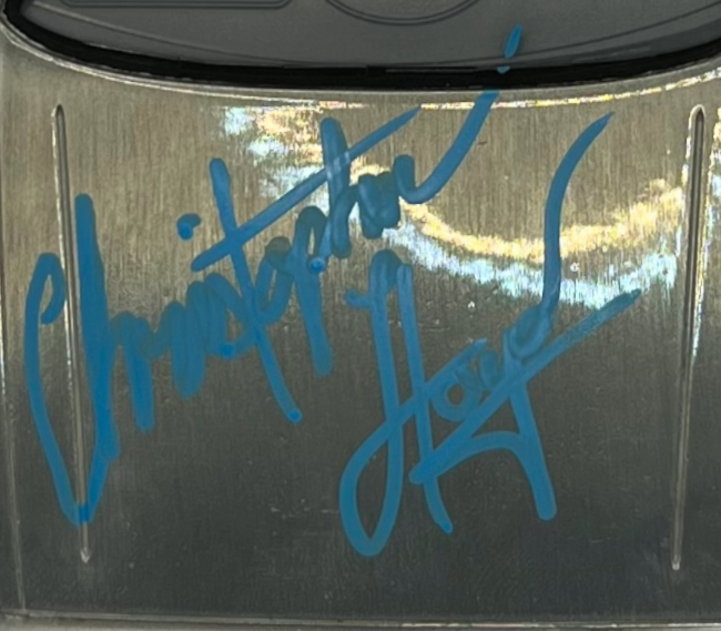 Close up of Christopher Lloyd Signed DeLorean