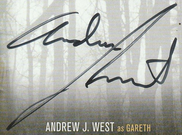 Close-up of Andrew J. West’s autograph on The Walking Dead memorabilia - Cryptozoic Certified